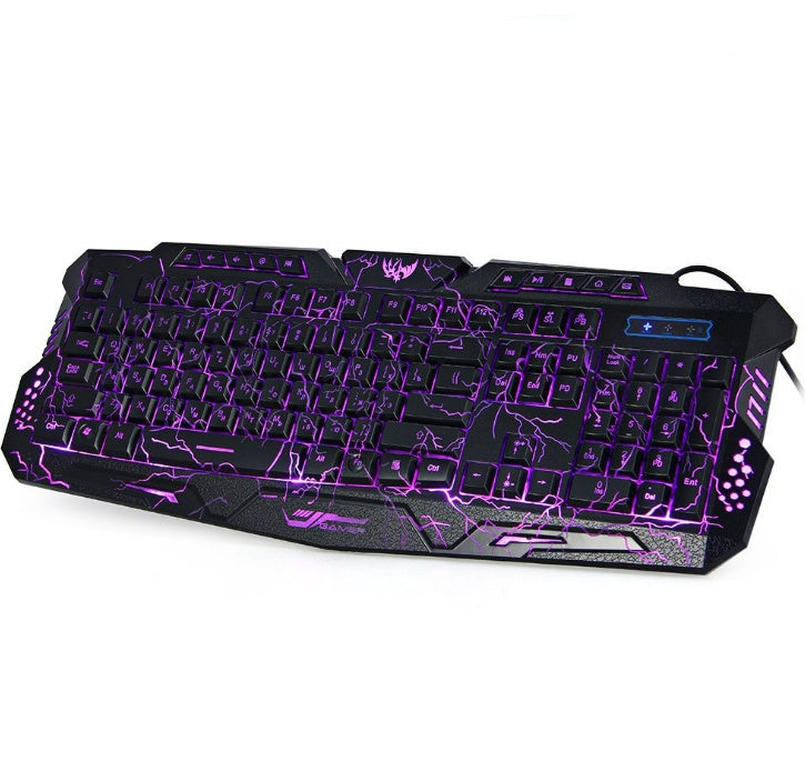 Gaming keyboard with purple backlighting on a white background