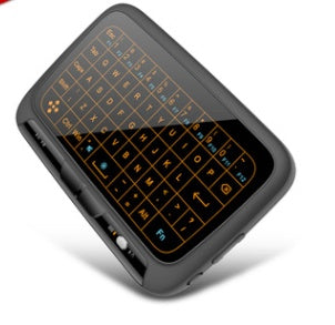 Portable keyboard with illuminated keys on a white background