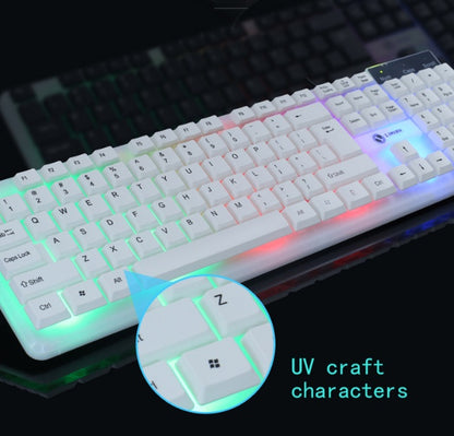 Glowing keyboard with UV-crafted characters on a dark background