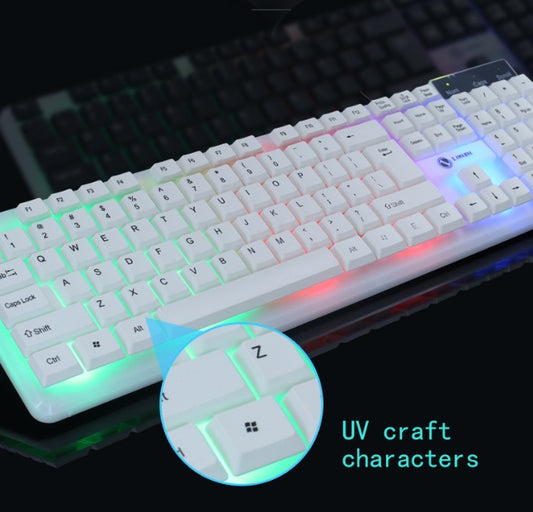 Glowing keyboard with UV-crafted characters on a dark background