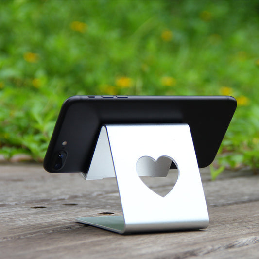 Adjustable aluminum alloy phone and tablet stand for desk use, compatible with iPhone, iPad, and Android devices